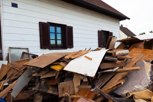 Discarded office furniture being cleared